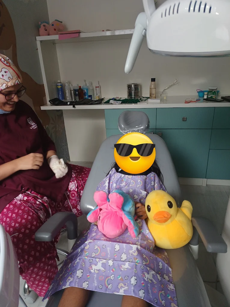 Brave child from JP Nagar after successful root canal treatment at Blueberry Dental