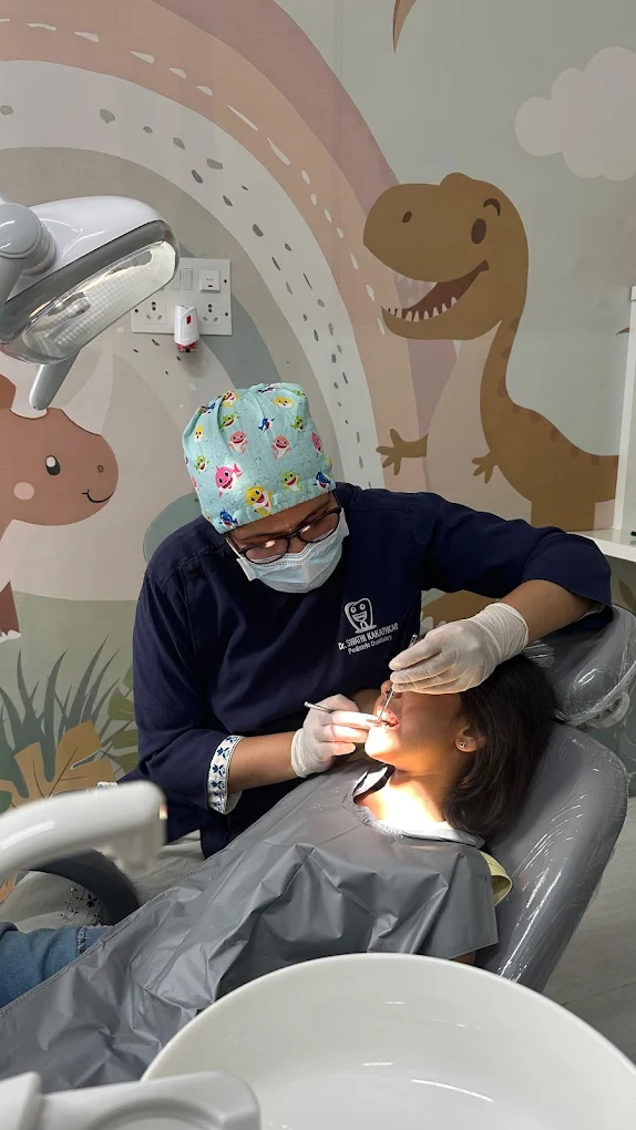 Painless dental filling for a child from Bilekahalli by Dr. Swathi Kakathkar